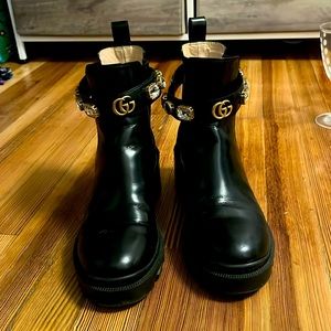 GUCCI LEATHER ANKLE BOOT with belt retails for $1250 on GUCCI and Saks 5th Ave.